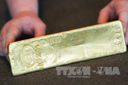 Giá vàng thế giới giảm nhẹ trước khi Mỹ và Trung ký thỏa thuận thương mại
