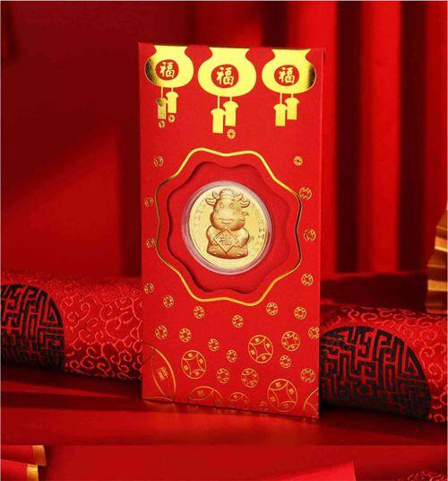 Bao lì xì hình trâu và thần tài mạ vàng "cháy hàng" trước thềm năm mới 2021