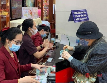 ‘Ôm’ cả cục tiền đi mua vàng, 'phố vàng' Hà Nội nhộn nhịp trước ngày vía Thần Tài