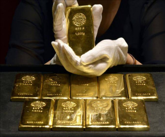 Giá vàng thế giới giảm hơn 1% sau cuộc họp của Fed