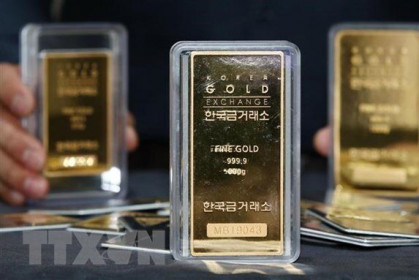 Giá vàng châu Á tăng phiên 28/7 trước khi kết thúc cuộc họp của Fed