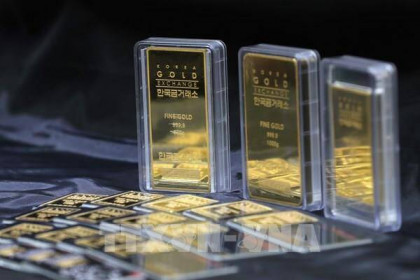 Giá vàng châu Á giảm phiên 25/8 khi nhà đầu tư chờ phát biểu của Chủ tịch Fed