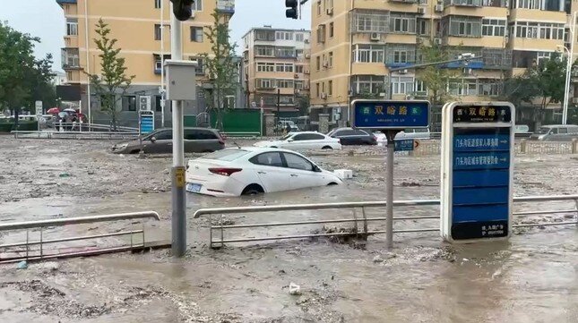 Bắc Kinh và vùng lân cận ngập lụt vì mưa lớn, ít nhất 20 người thiệt mạng ảnh 4