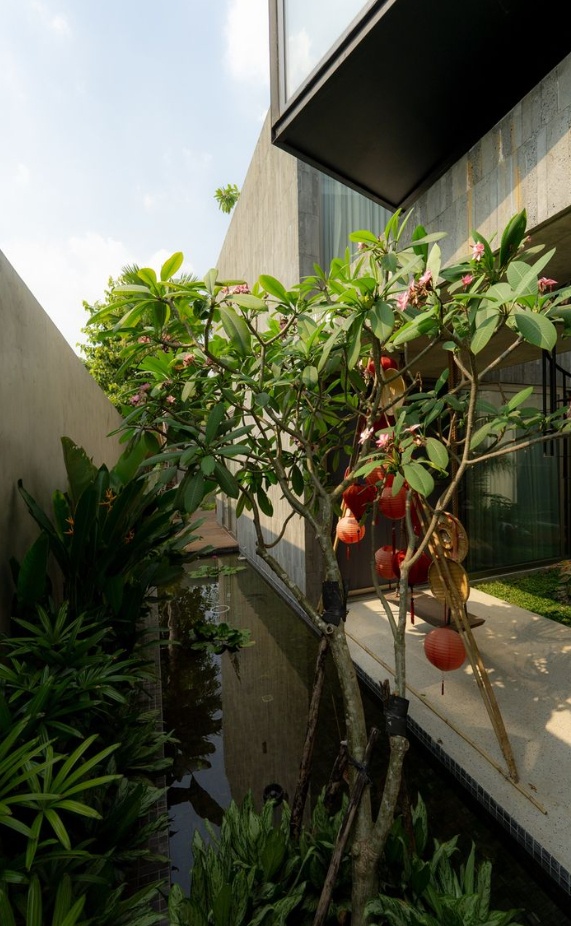 Phong cách nhiệt đới Á Đông kết hợp kiến trúc hiện đại trong căn biệt thự ven sông ảnh 10